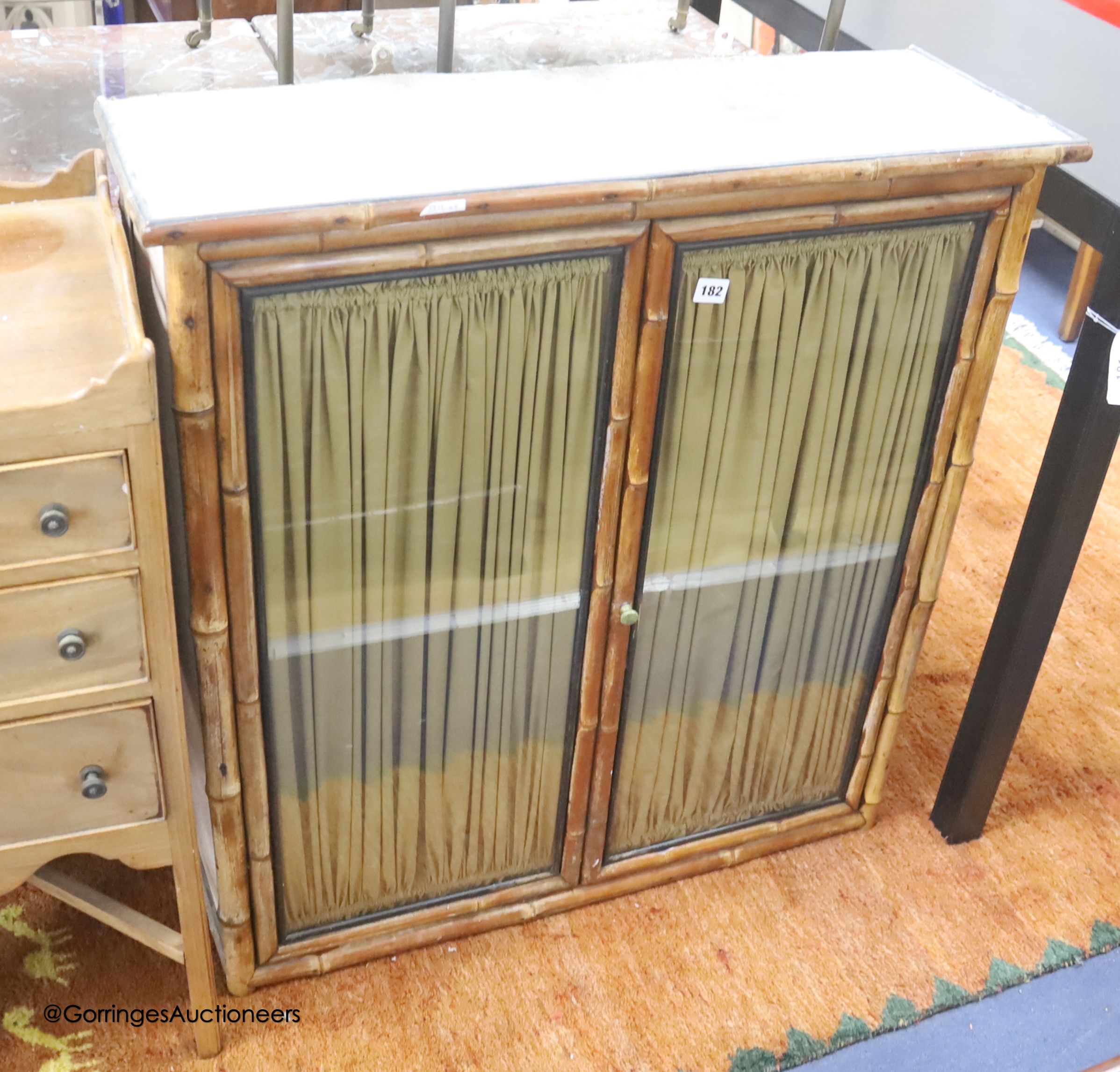 A Victorian wall hanging bamboo two door cabinet, width 84cm depth 29cm height 88cm